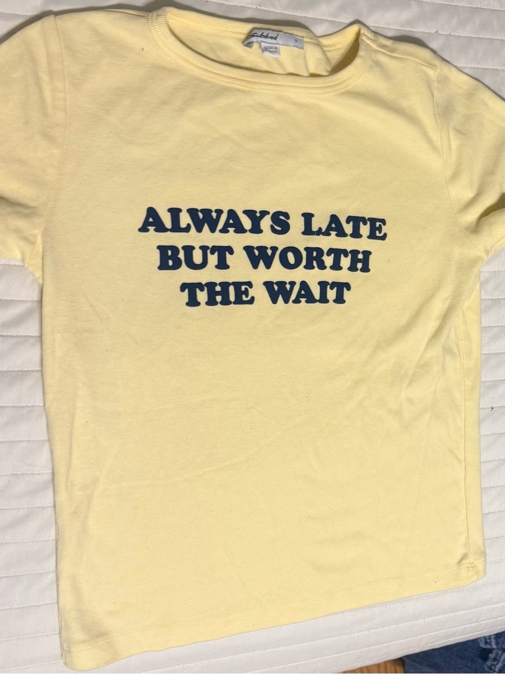 Neve worn subdued Yellow 'Always Late But Worth The Wait' Graphic Tee